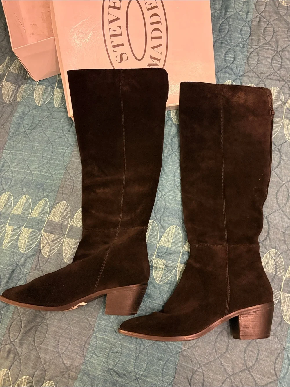 Black suede boots. Nothing more. Nothing less. Over the knee.